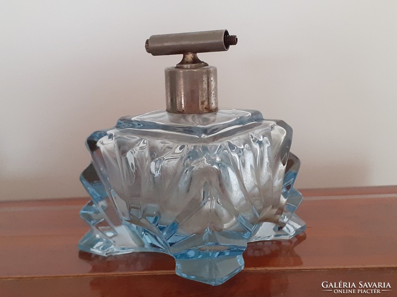 Old art deco perfume bottle circa 1930 with blue glass cologne