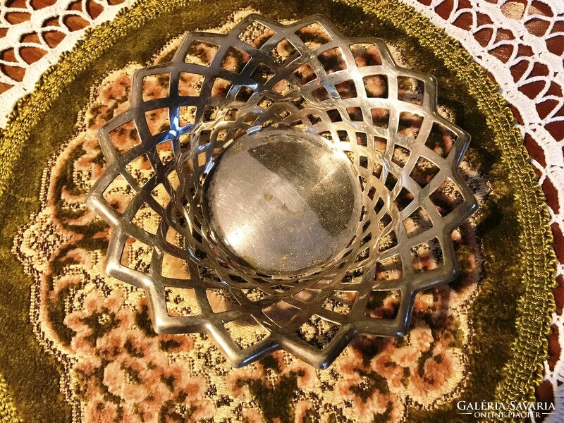 A bowl offering a wonderful, silver-plated, pierced, marked delicacy or sugar cubes