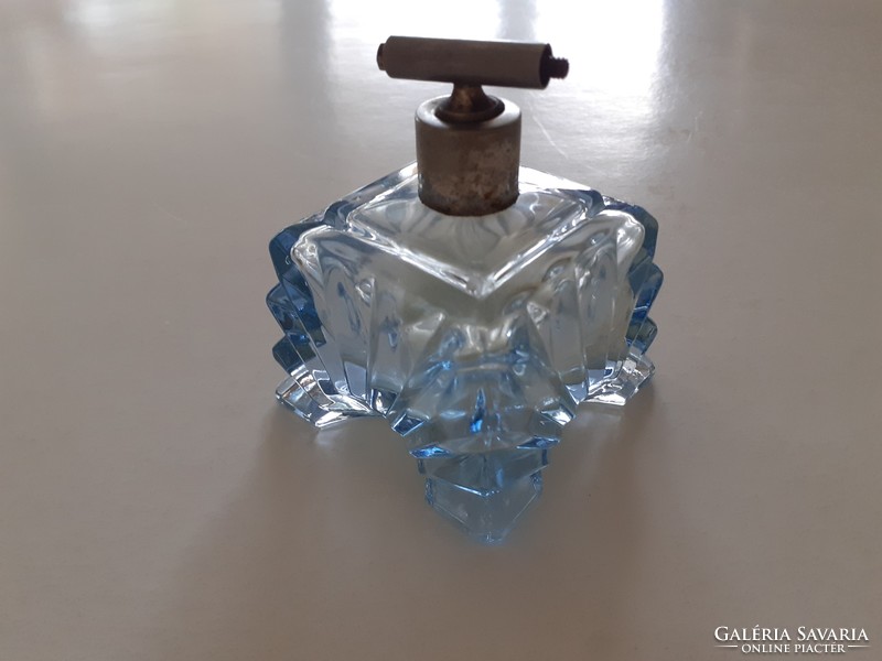 Old art deco perfume bottle circa 1930 with blue glass cologne