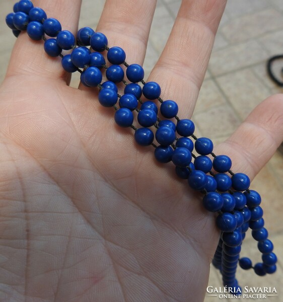 Old blue plastic pearl necklace