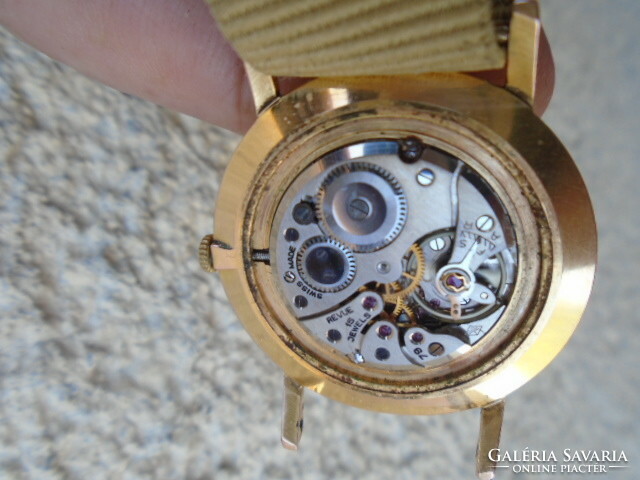 Extra flat revue ffi wristwatch, the mechanism (the movement is either a rolex or a safi)