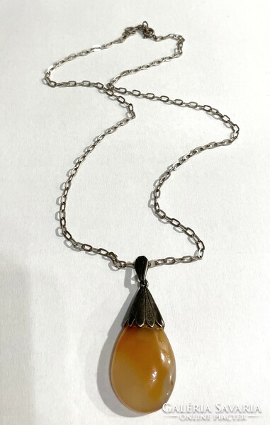 Carnelian stone pendant with silver socket and silver necklace