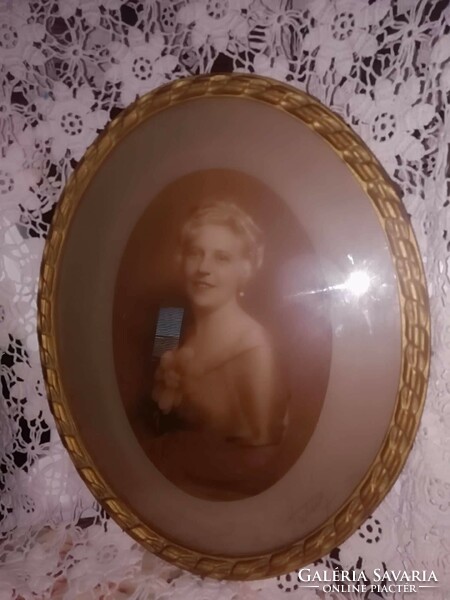 Old antique lady photo in oval wooden frame 1910s