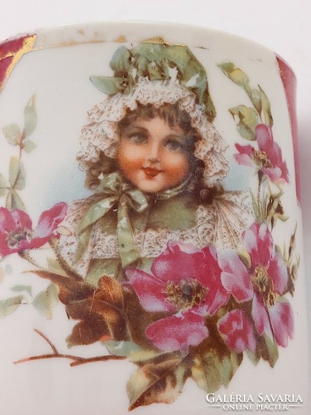 Old porcelain small mug with little girl's floral pattern