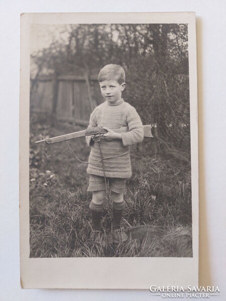 Old postcard photo postcard with little boy with rifle