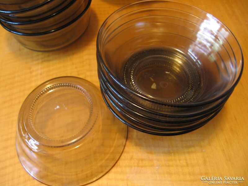 Smoke colored glass compotes, salad, ice cream in creamy bowls