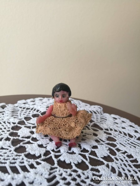 Rarity antique blinking miniature doll