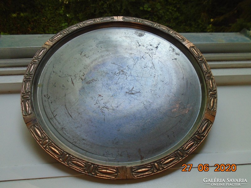 Heavy round tinned copper tray with bronze embossed rim