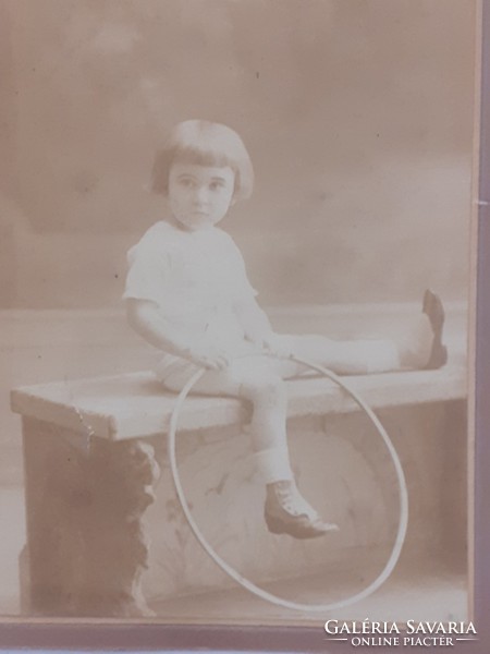 Old child photo of little girl with hoop vintage photo