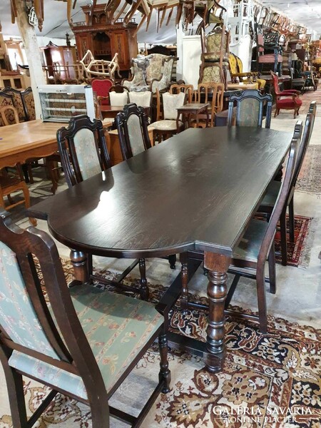 Antique hardwood dining / meeting table with 6 upholstered chairs