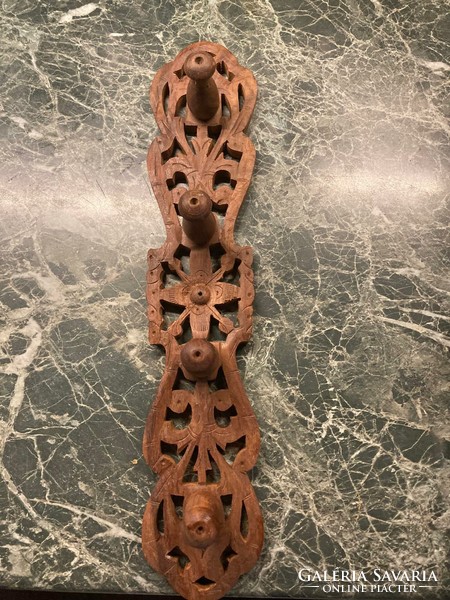 Nicely crafted wooden coat hanger from India
