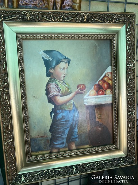 Little boy choosing an apple