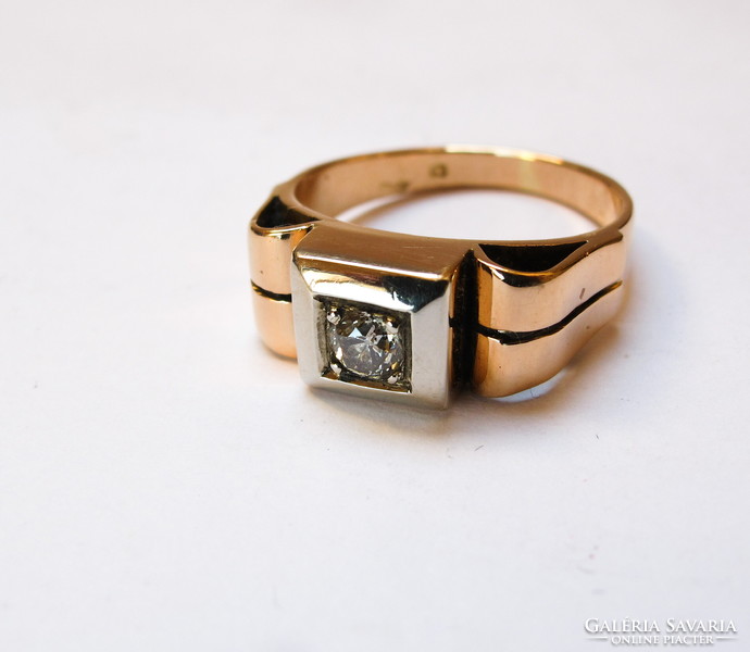 Gold ring with diamonds.