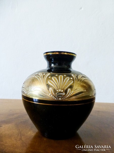 Black glass vase painted with gold