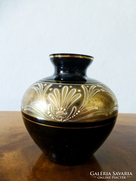 Black glass vase painted with gold