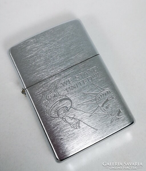 Zippo lighter with new york freedom statue motif, own holder, in new condition