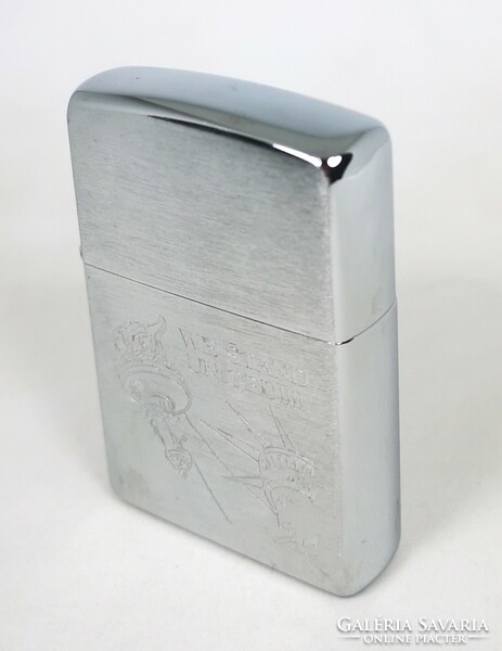 Zippo lighter with new york freedom statue motif, own holder, in new condition