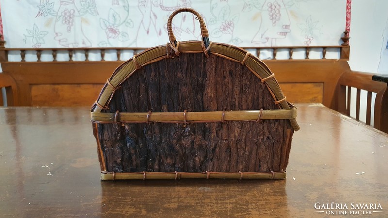 Old table or wall basket, flower stand. It is made by hand from wood shavings and bark