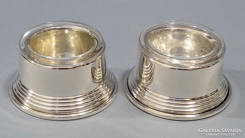 Old silver spice rack in pairs