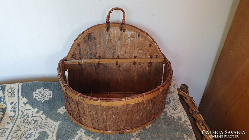 Old table or wall basket, flower stand. It is made by hand from wood shavings and bark