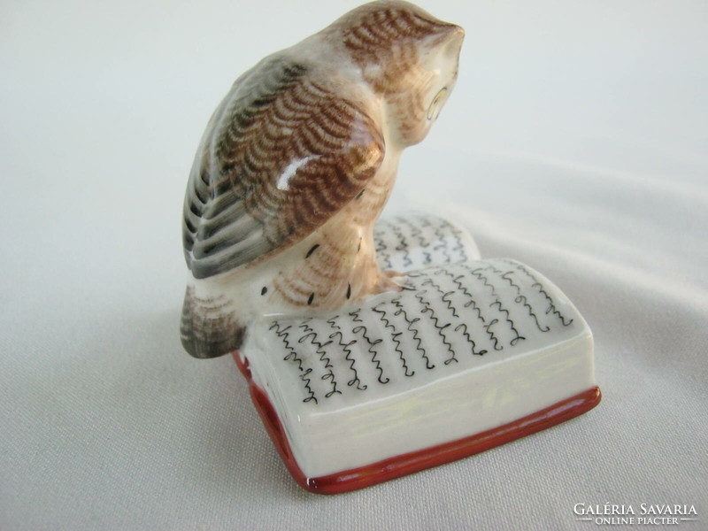 Retro ... A wise owl sitting on a nipple book with a porcelain drasche porcelain figurine