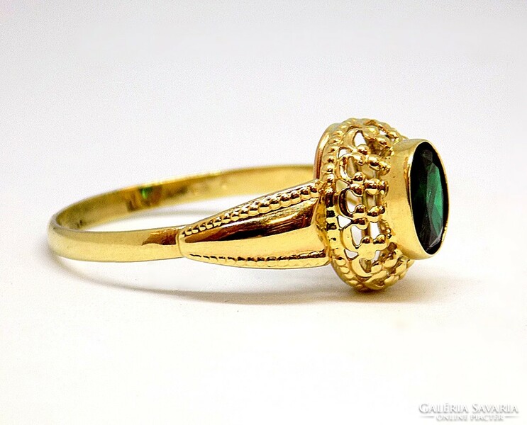 Gold ring with green stones (zal-au107997)