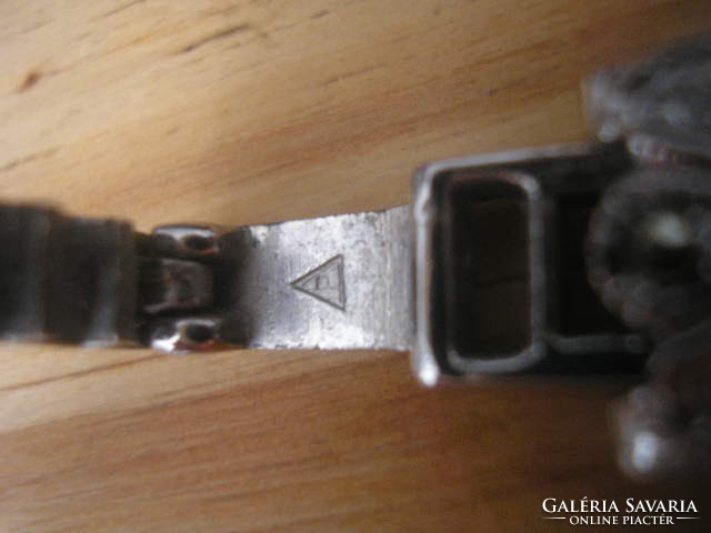 N 29 antique bracelet with p marking in a triangle, the material of which is being identified