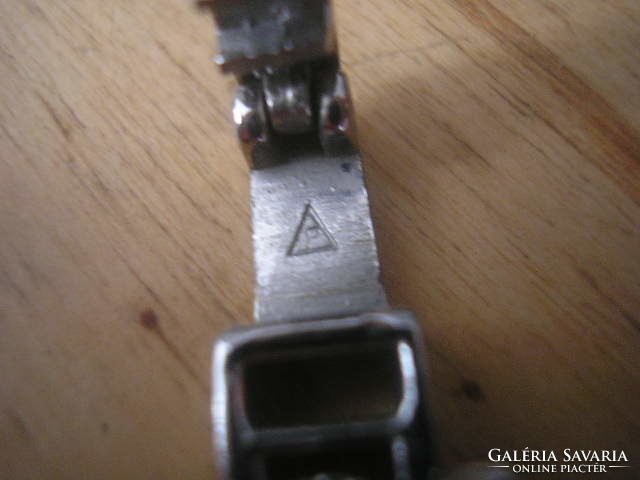N 29 antique bracelet with p marking in a triangle, the material of which is being identified