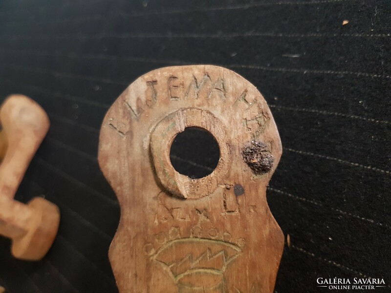 Old wooden lock mechanism.