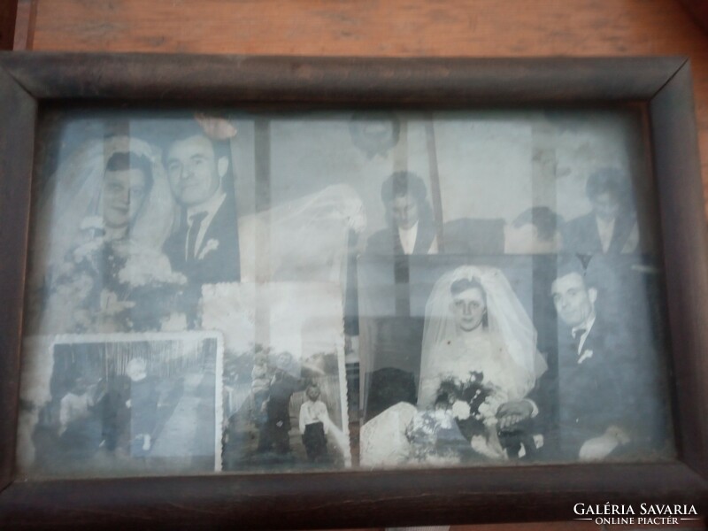 Old photos in a glazed wooden frame