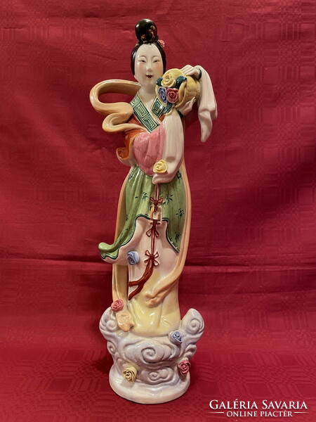 Large porcelain geisha statue