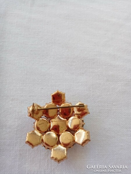 Old shiny stone brooch pin