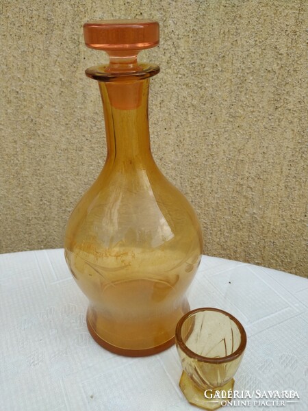 Amber colored cut glass, bottle with 1 cup for sale!