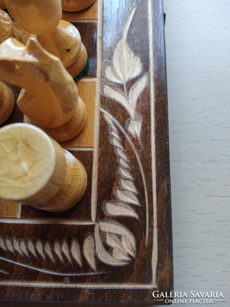 Wooden chess set in a collapsible box