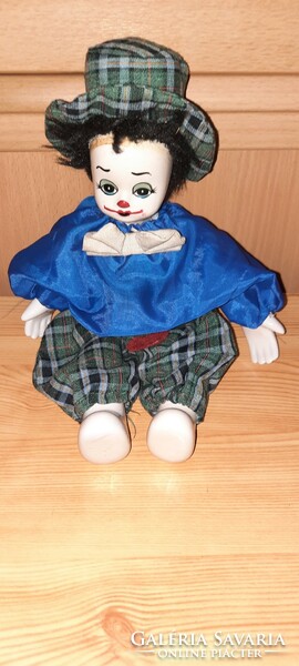 A clown with an old porcelain head