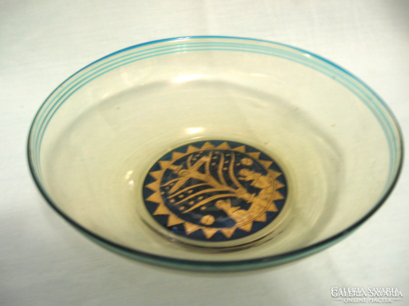 Thin artistic blue glass bowl, with a golden crucifix at the bottom. From Murano?