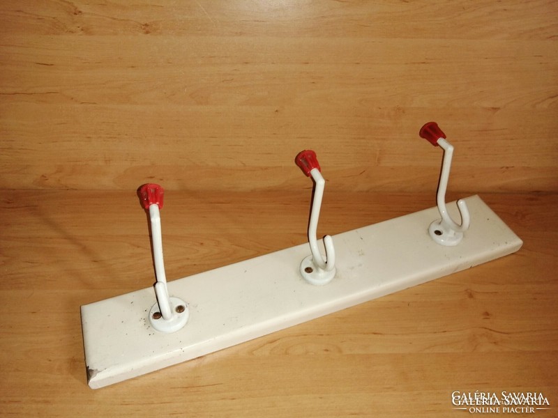 Retro aluminum hanger on a wooden stand