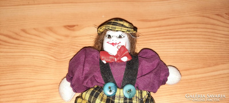 A clown with an old porcelain head
