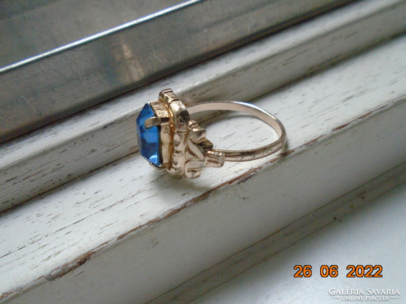 Silver-plated ring with a sapphire-colored polished stone