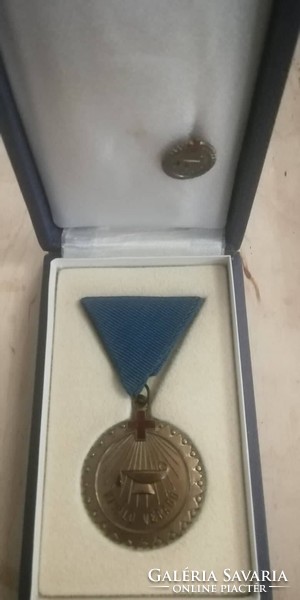 Excellent blood donation award and its small badge in a gift box