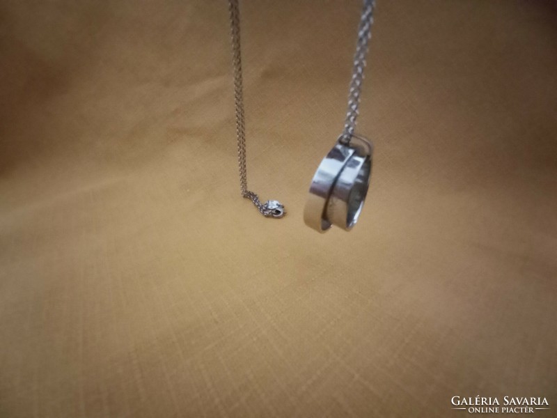 Calvin Klein pendant on a silver chain