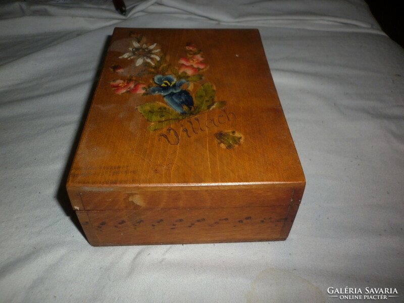 Old wooden box painted with floral pattern