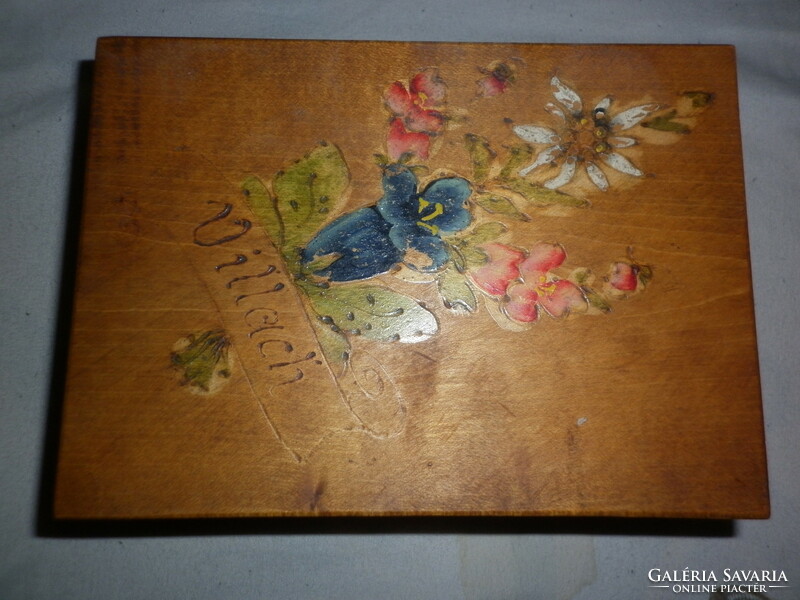 Old wooden box painted with floral pattern