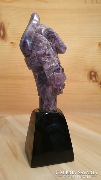 Amethyst Aztec head on black obsidian pedestal