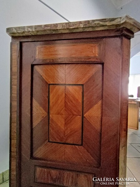 Small cabinet with marble inlay