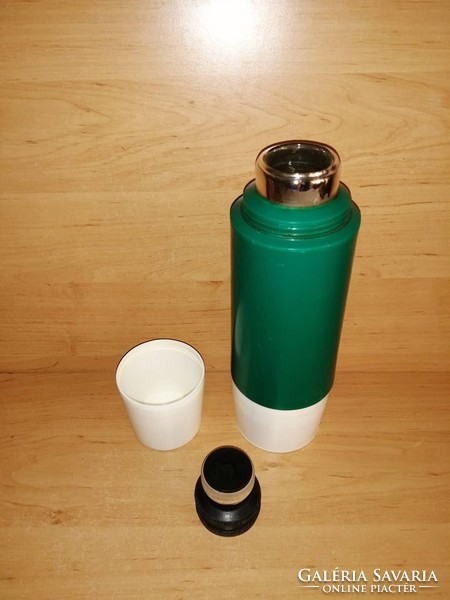 Retro green plastic coffee and tea thermos