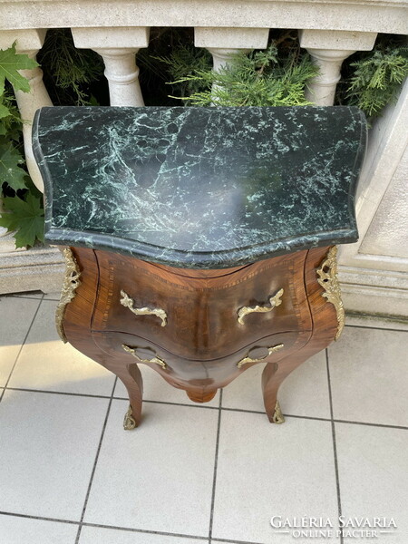 A wonderful small chest of drawers with a marble top