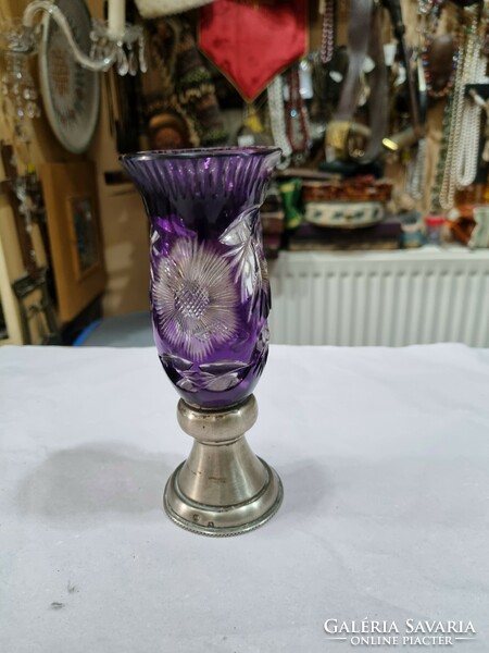 Crystal vase with silver base.