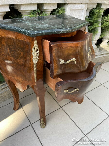 A wonderful small chest of drawers with a marble top