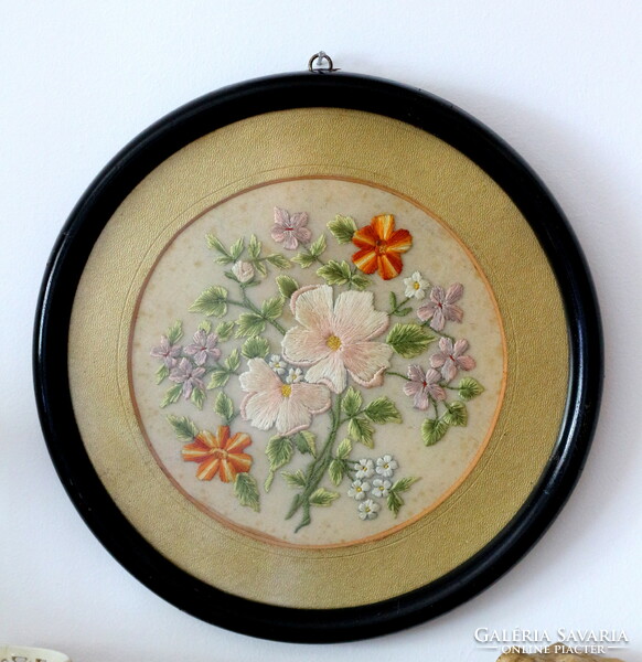 Beautiful antique tulle embroidery in a frame, wall picture